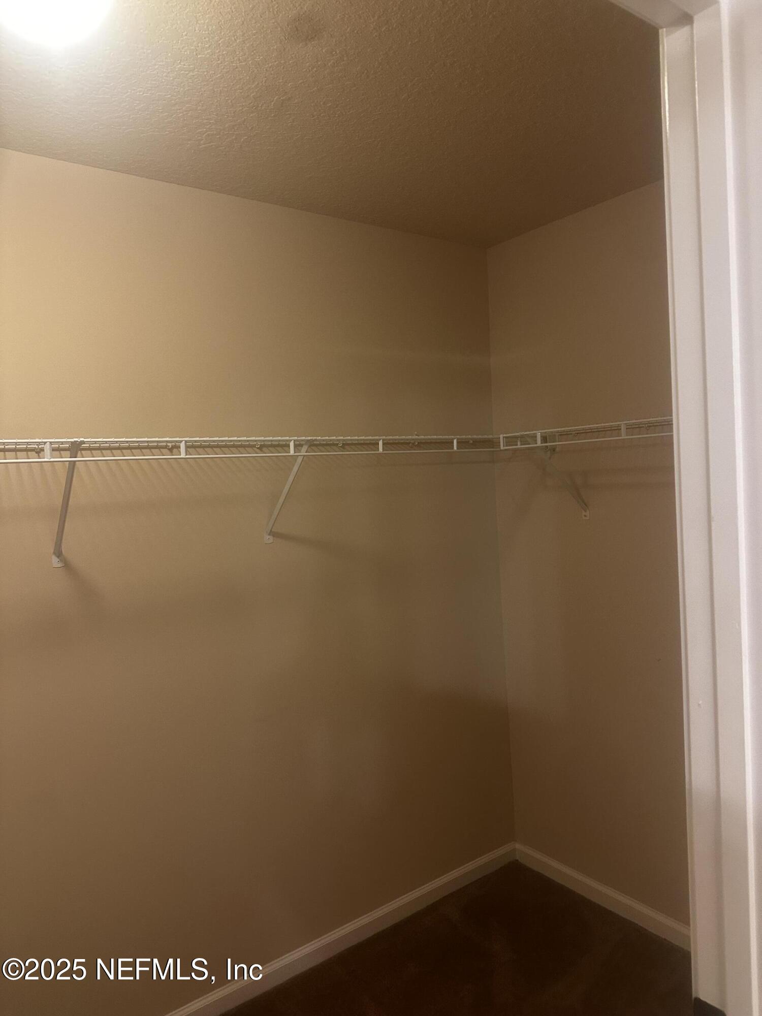 45157 Ingleham Circle Callahan, FL 32011 - Photo 29 of 48 a view of small space with racks on the wall