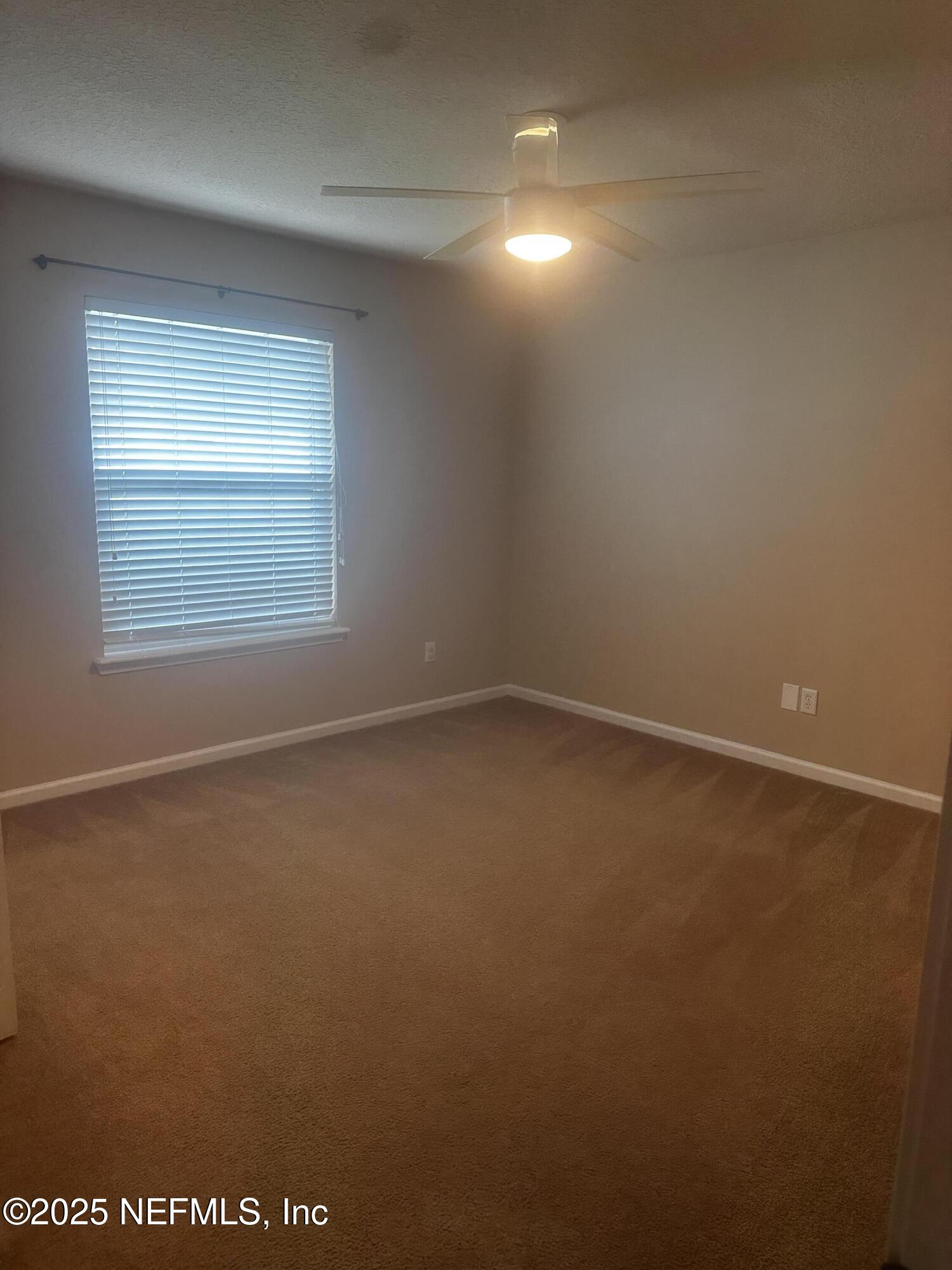 45157 Ingleham Circle Callahan, FL 32011 - Photo 34 of 48 an empty room with a window
