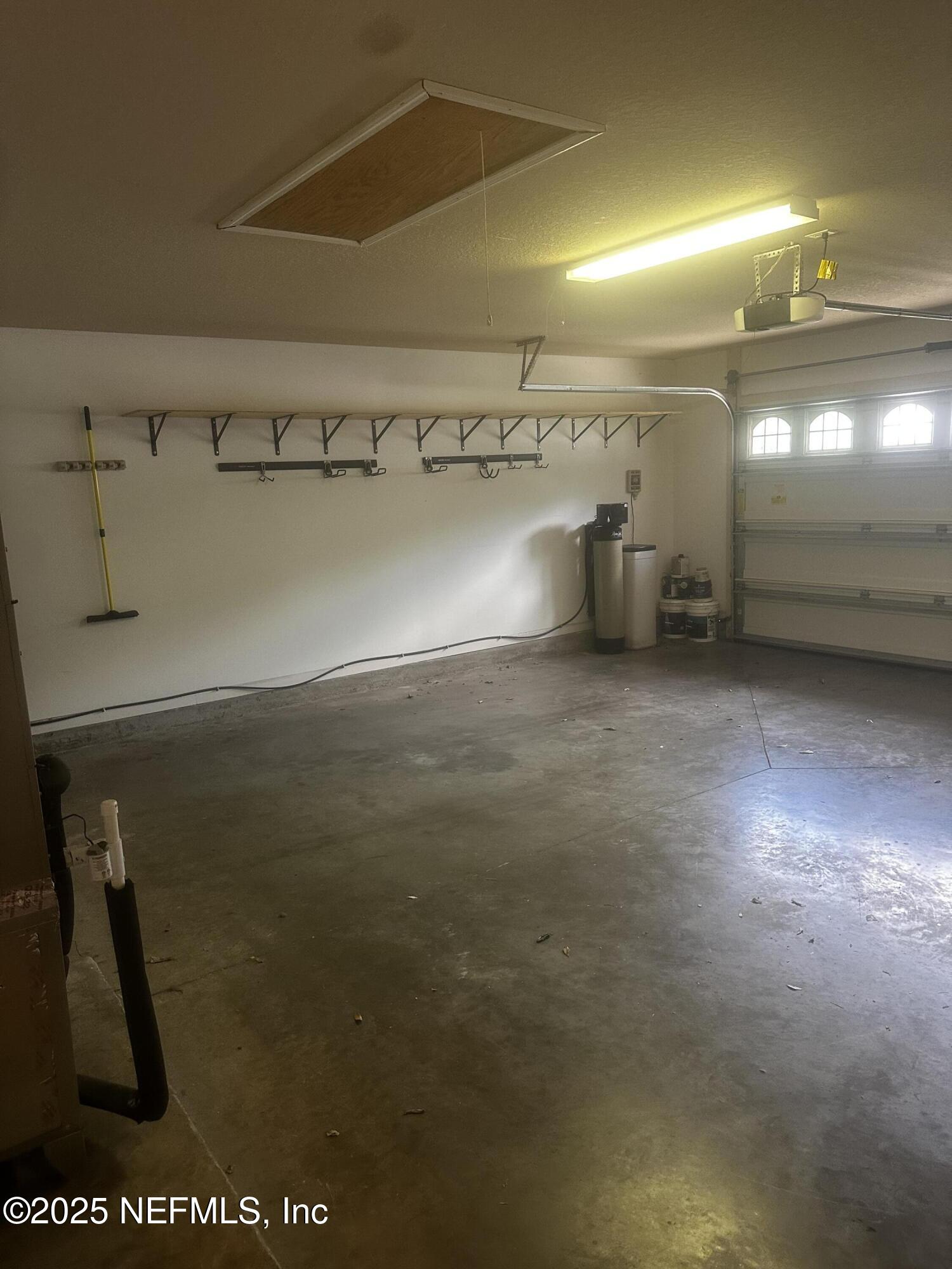 45157 Ingleham Circle Callahan, FL 32011 - Photo 46 of 48 a view of a room with racks on the wall