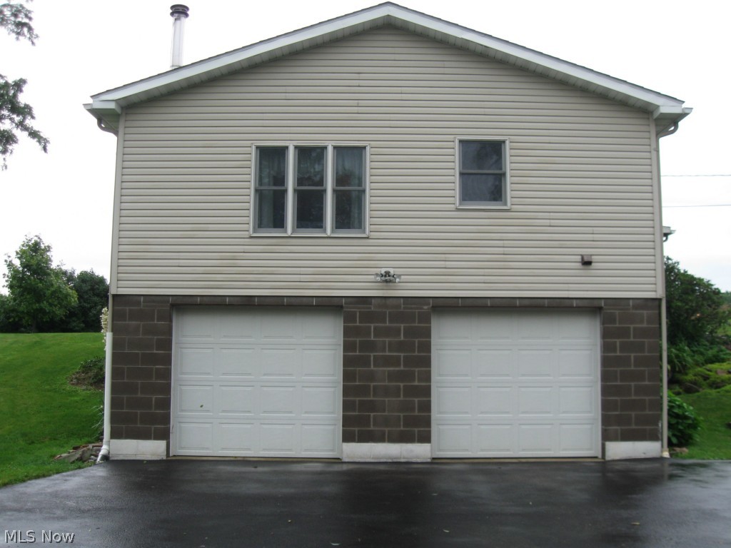 3963 State Road Medina, OH 44256 - Photo 6 of 25 Large, solid garage with access from garage to basement.
