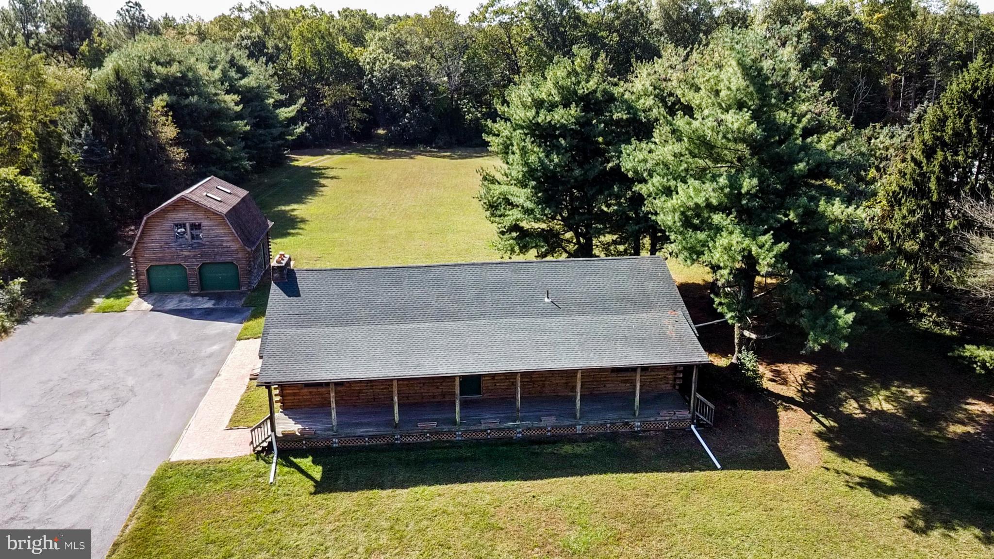 337 Harding Highway Pittsgrove, NJ 08318 - Photo 13 of 68 an aerial view of a house with swimming pool and large trees