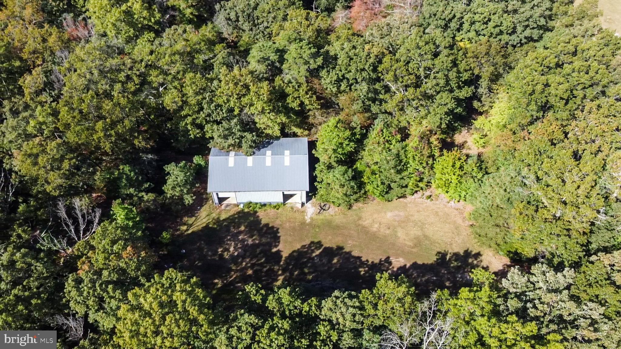 337 Harding Highway Pittsgrove, NJ 08318 - Photo 18 of 68 a backyard of a house with a yard and outdoor seating