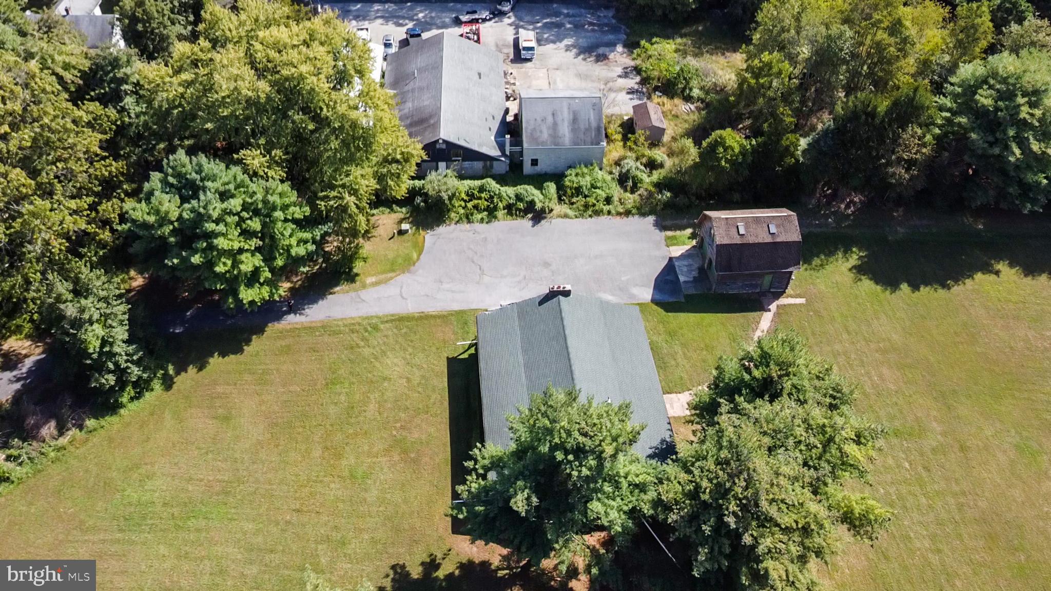 337 Harding Highway Pittsgrove, NJ 08318 - Photo 22 of 68 an aerial view of a house with a yard and lake view