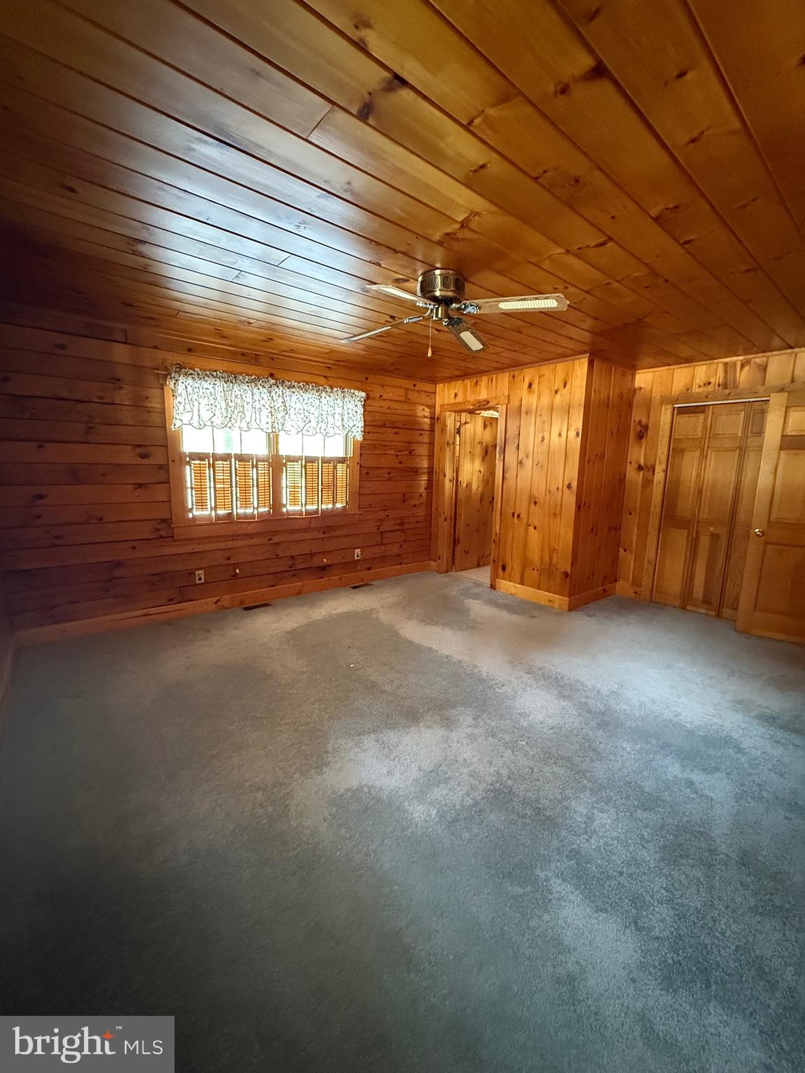 337 Harding Highway Pittsgrove, NJ 08318 - Photo 52 of 68 a view of a livingroom with an empty space and a window