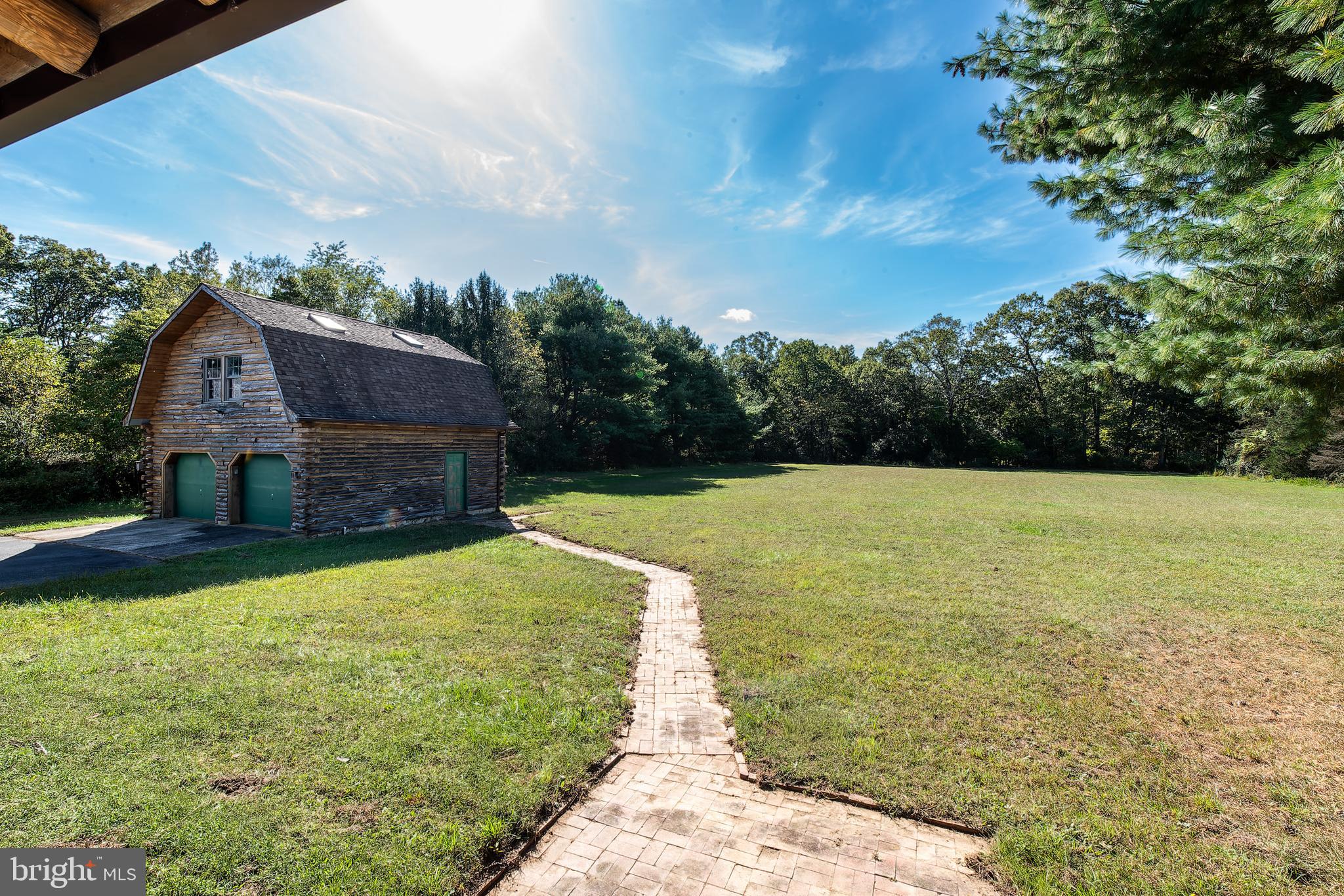 337 Harding Highway Pittsgrove, NJ 08318 - Photo 10 of 68 a view of a patio with a garden