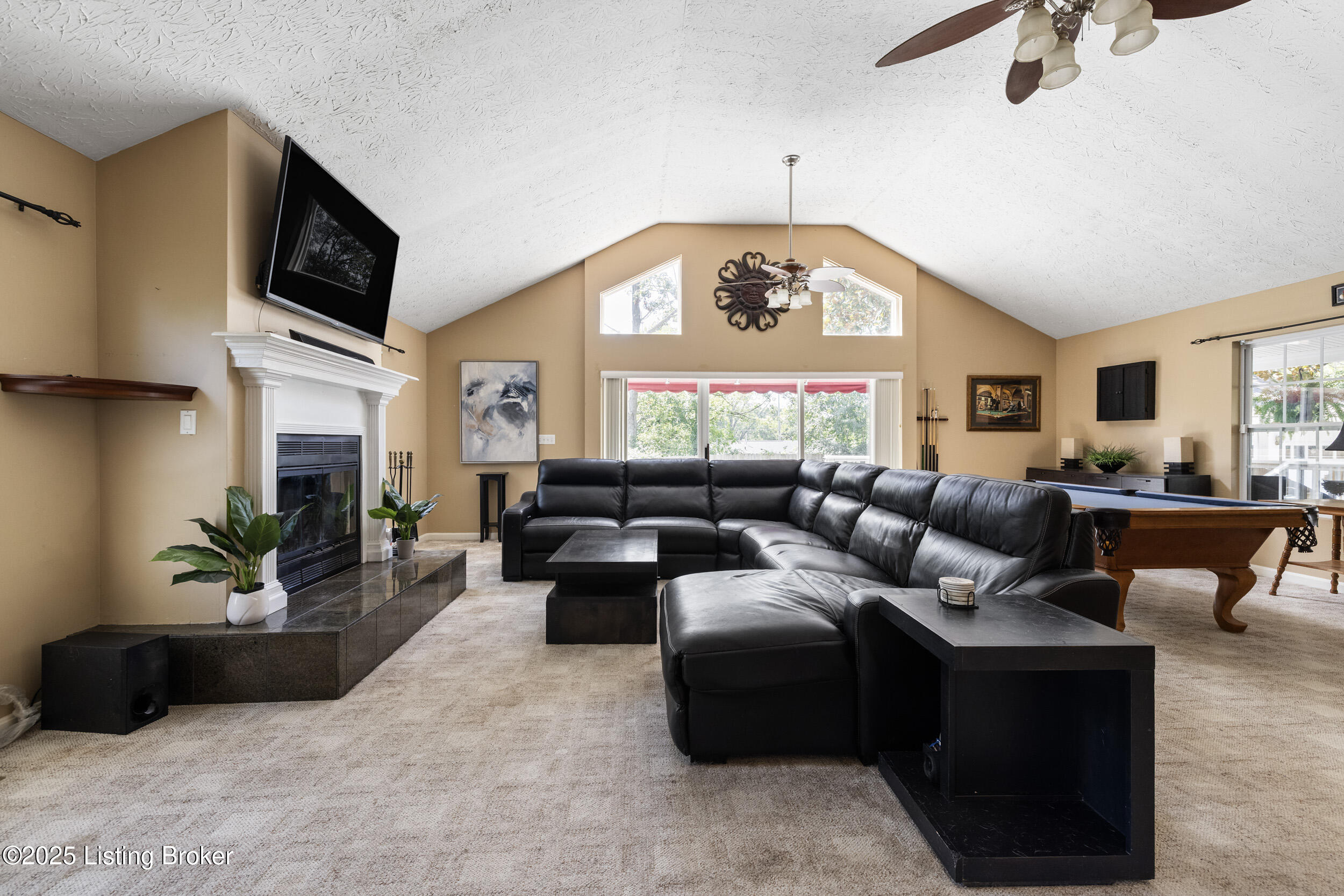 4112 Billtown Road Louisville, KY 40299 - Photo 20 of 53 this enormous vaulted great room with working fireplace has plenty of breathing room, even with the large sectional and pool table