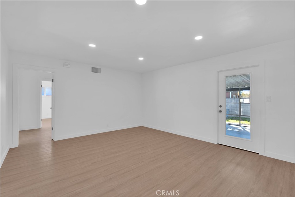 1007 North Mohawk Avenue Anaheim, CA 92801 - Photo 11 of 31 an empty room with windows and closet