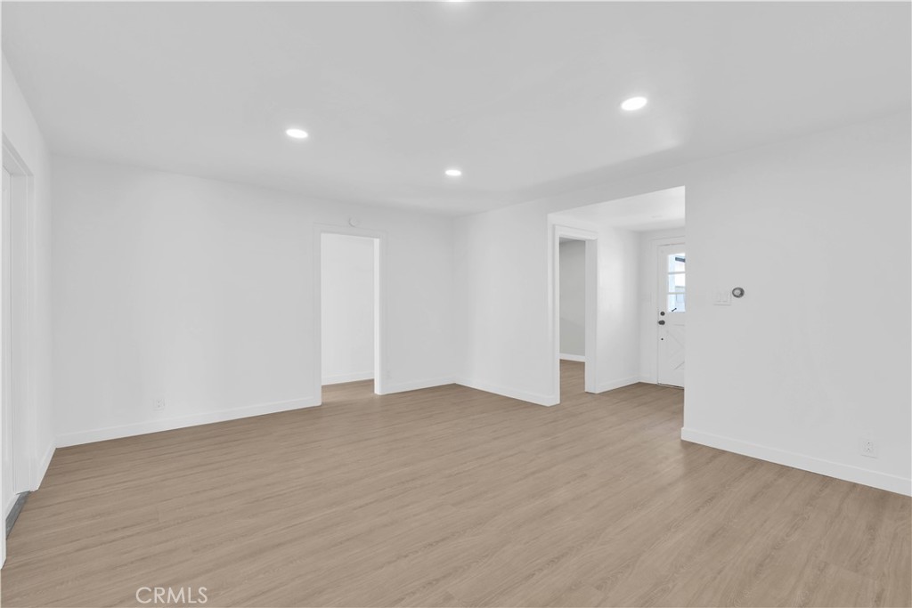 1007 North Mohawk Avenue Anaheim, CA 92801 - Photo 13 of 31 a view of an empty room with wooden floor