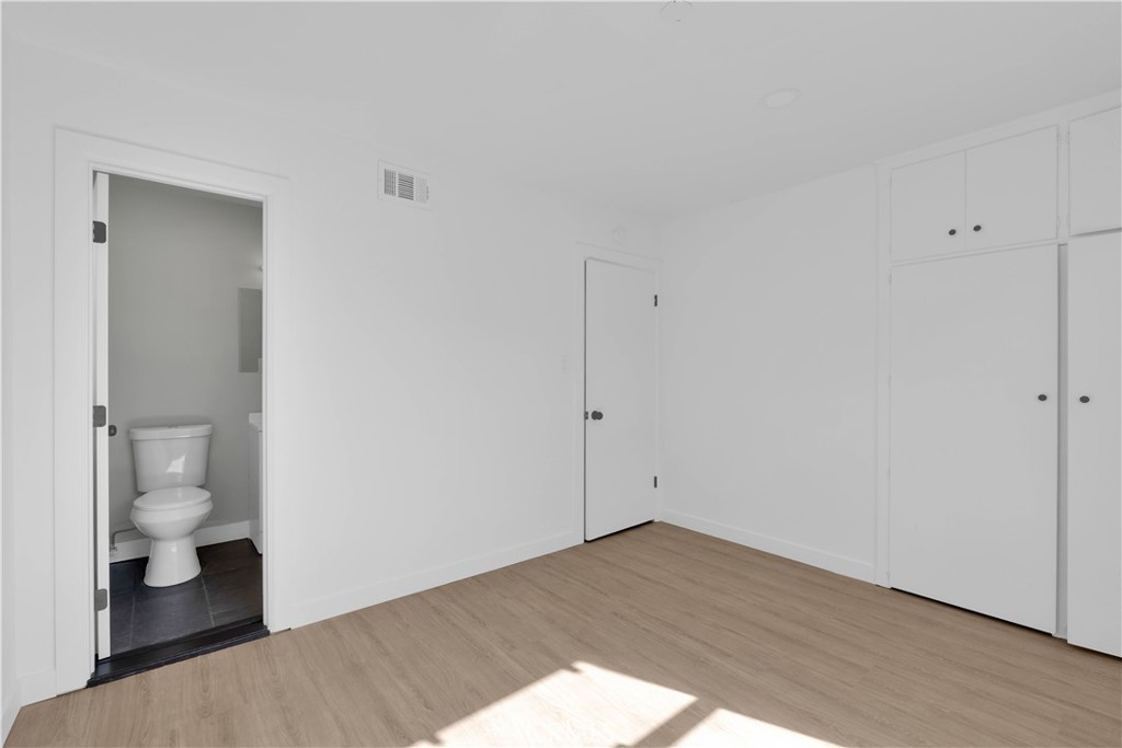 1007 North Mohawk Avenue Anaheim, CA 92801 - Photo 16 of 31 a view of a room with wooden floor and a sink