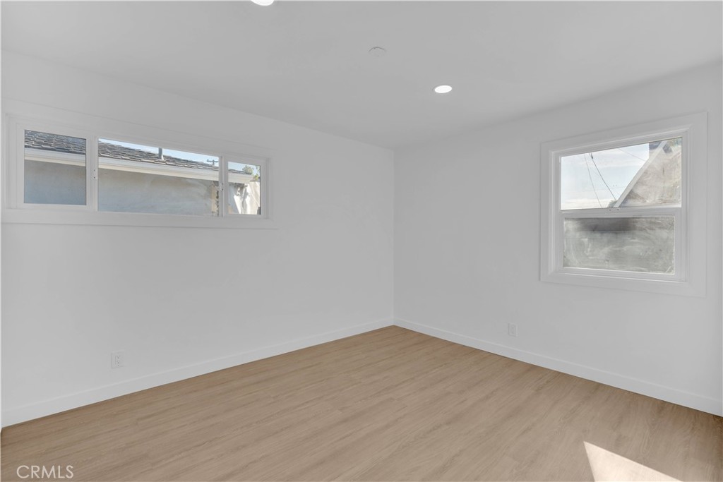 1007 North Mohawk Avenue Anaheim, CA 92801 - Photo 19 of 31 a view of a room with wooden floor and fan