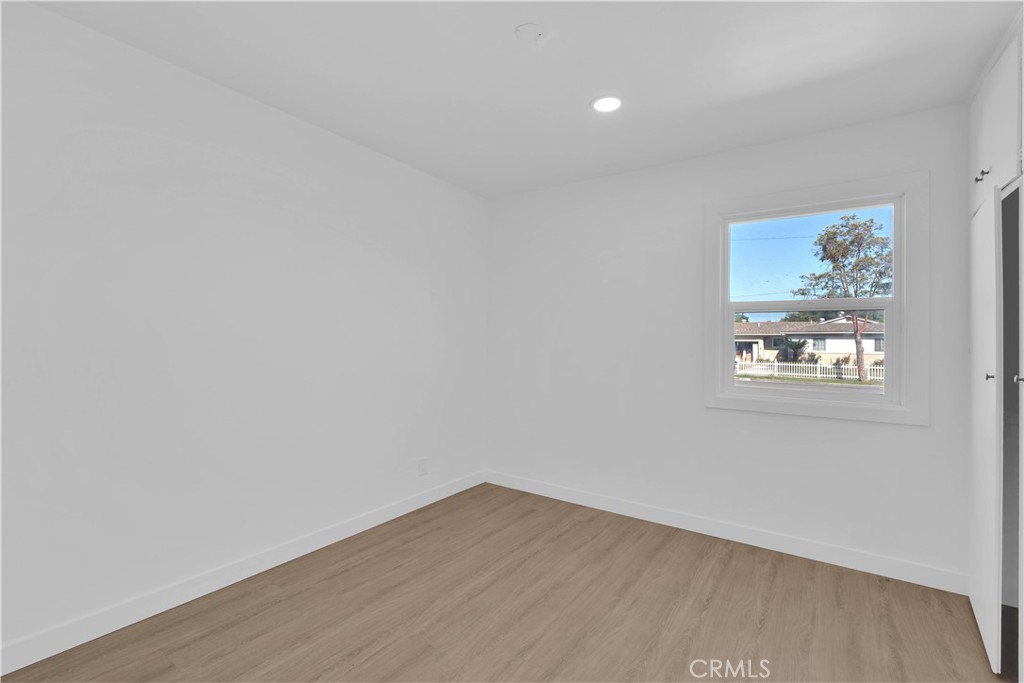 1007 North Mohawk Avenue Anaheim, CA 92801 - Photo 25 of 31 a view of a small space with wooden floor and a window