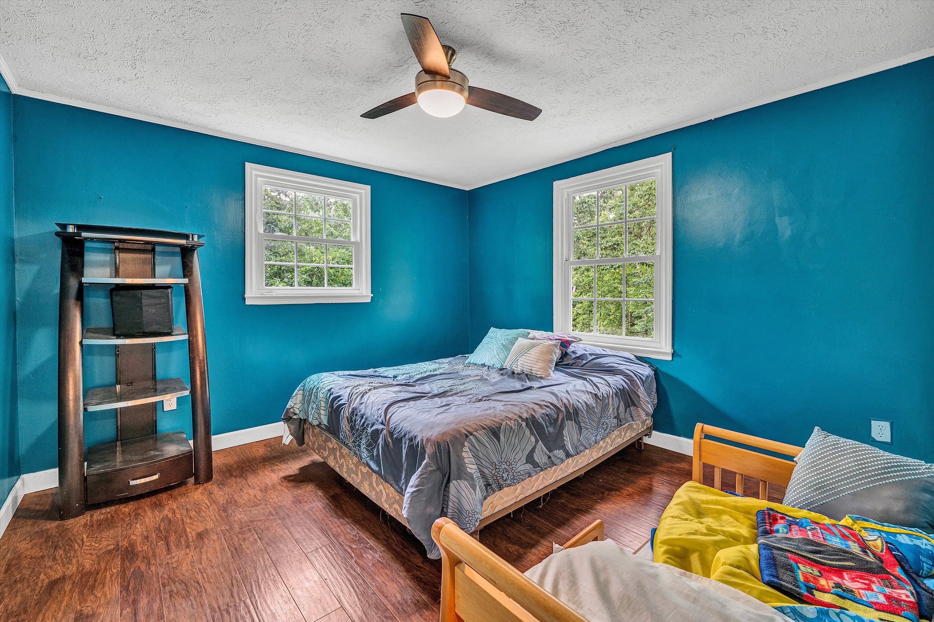 2095 Webster Road Glade Hill, VA 24092 - Photo 8 of 20 a bedroom with a bed and a window