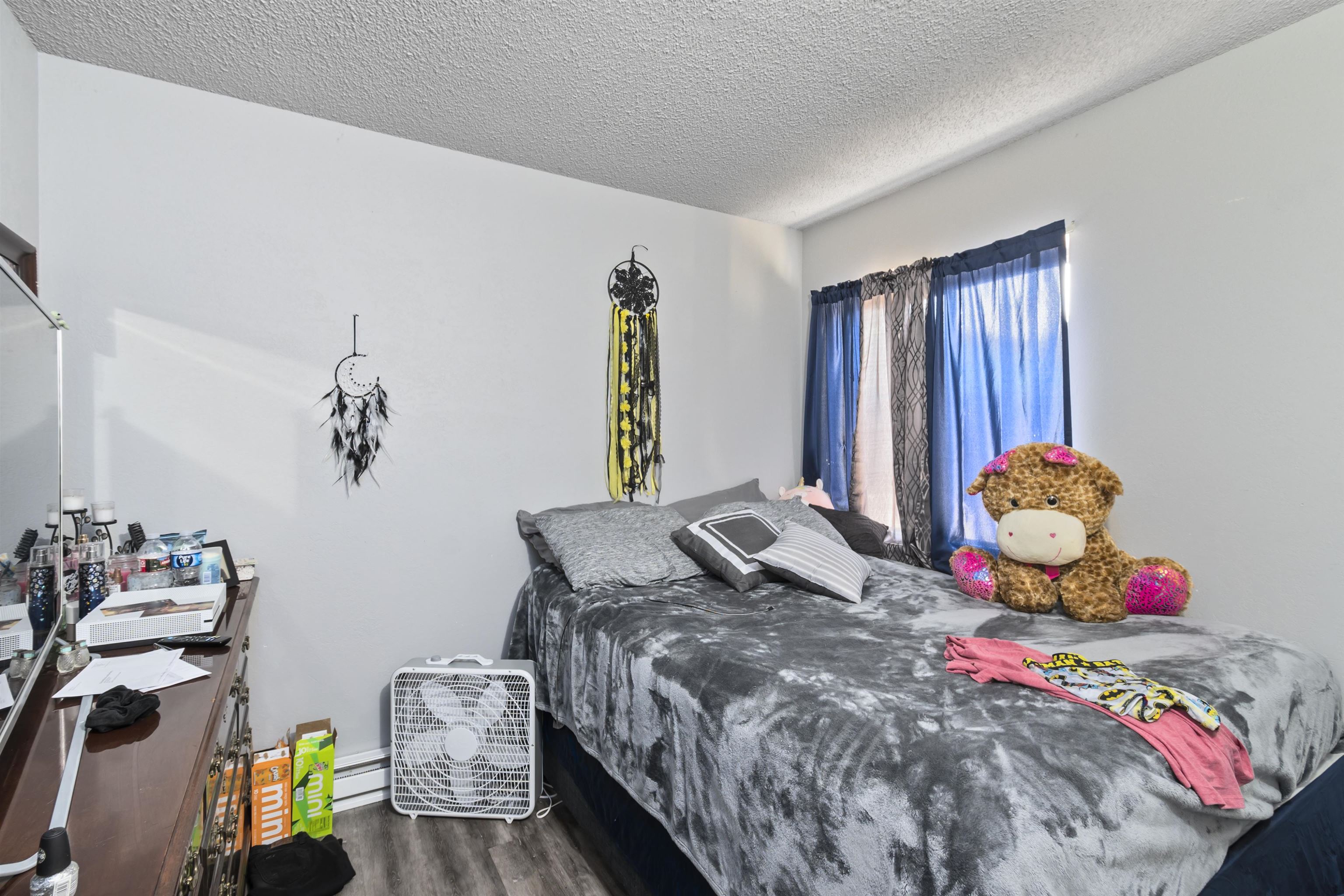 557 North Sparn Street Grand Junction, CO 81501 - Photo 17 of 31 a bedroom with a bed and a window