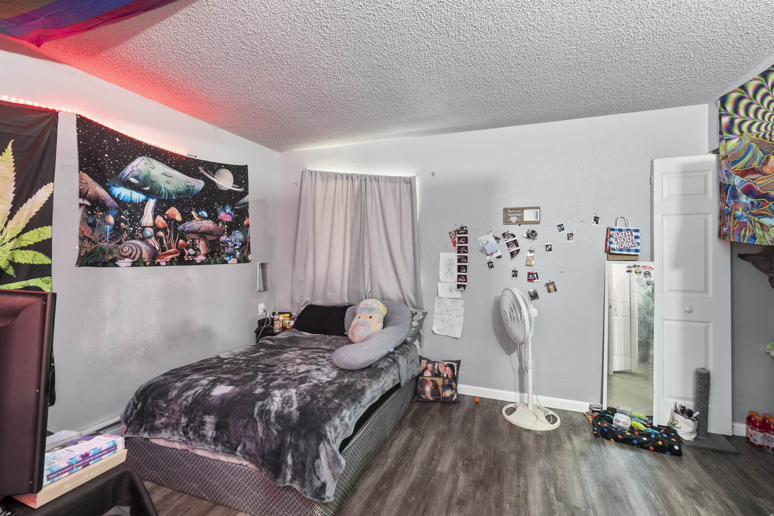 557 North Sparn Street Grand Junction, CO 81501 - Photo 18 of 31 a bedroom with a bed and a couch