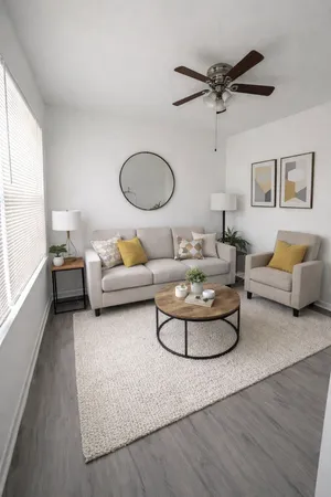 a living room with furniture and a window