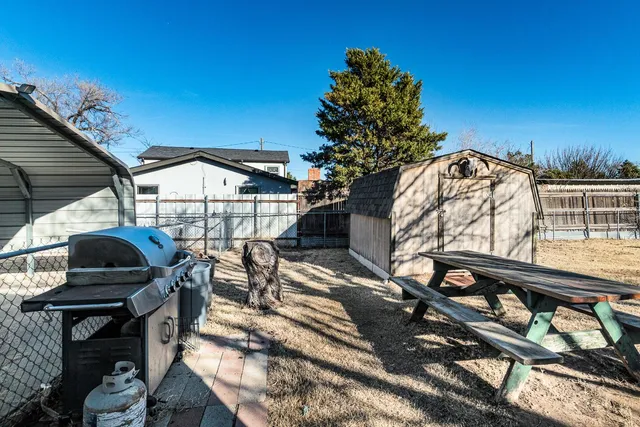 a view of a balcony with chairs