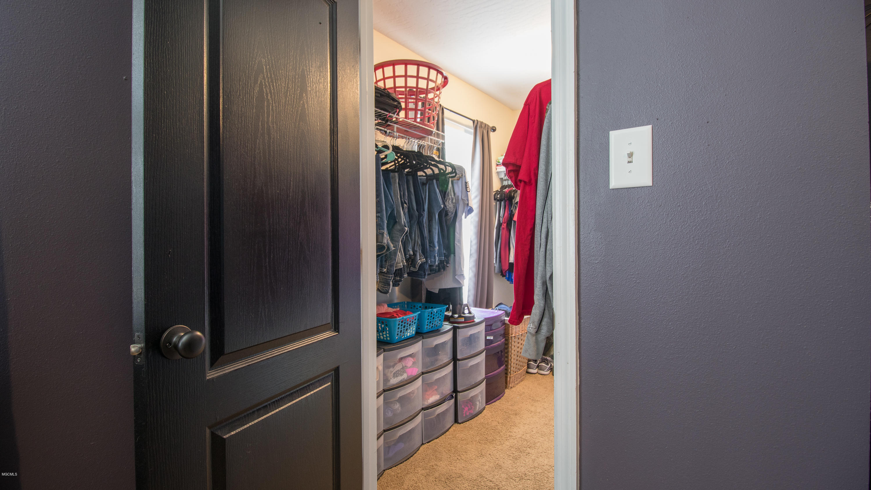 8129 Rue Holifield Central Ocean Springs, MS 39564 - Photo 12 of 18 Master walk-in closet