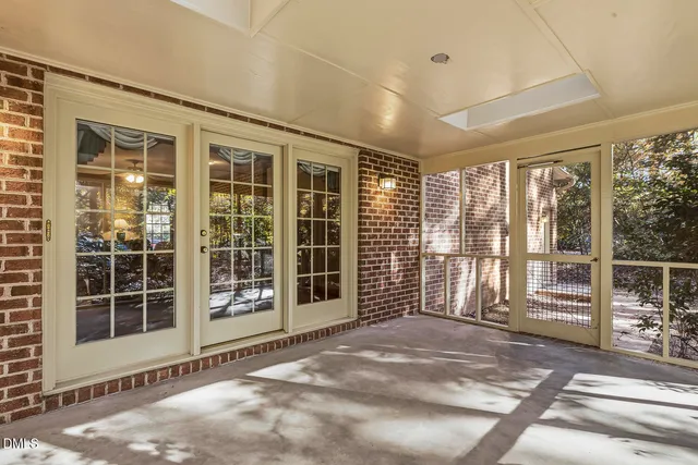 a view of an empty room with a balcony