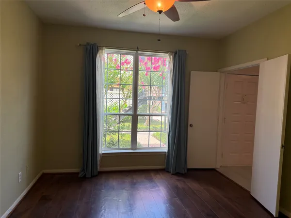 a view of entryway with wooden floor