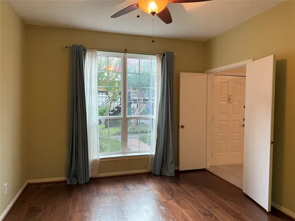 a view of a bathroom with a sink and a mirror