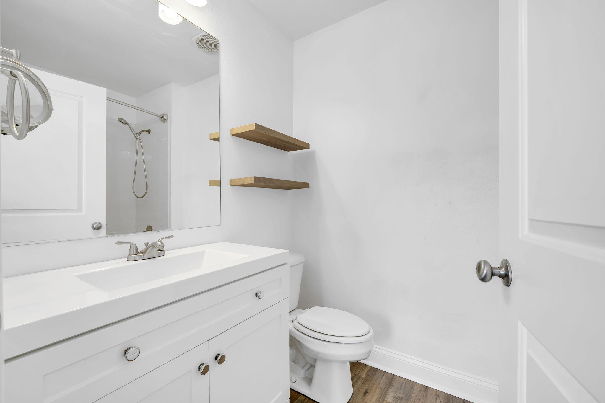 29 North Sand Palm Road Freeport, FL 32439 - Photo 12 of 40 a bathroom with a sink toilet and shower
