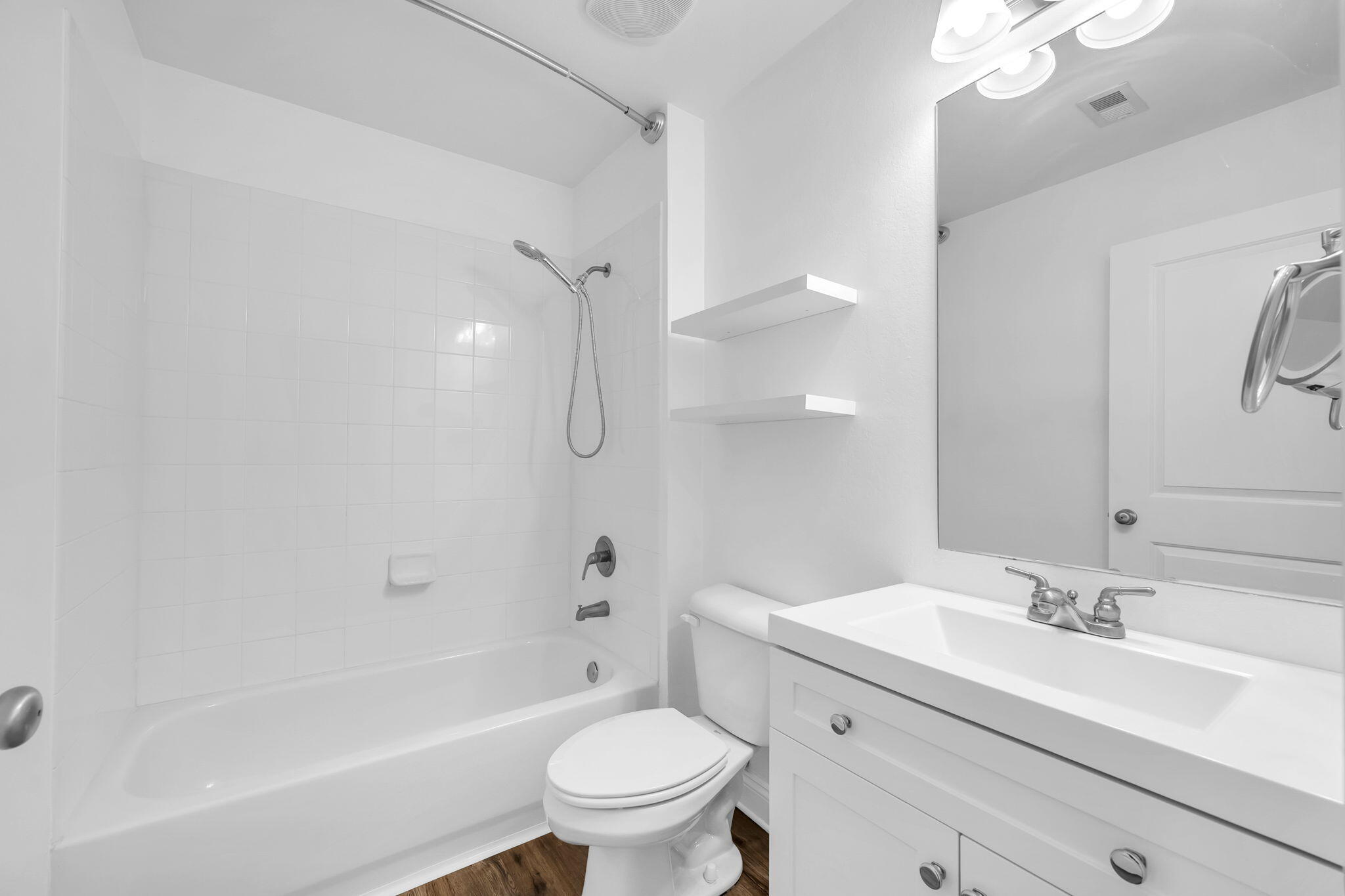 29 North Sand Palm Road Freeport, FL 32439 - Photo 18 of 40 a bathroom with a sink toilet tub vanity and shower