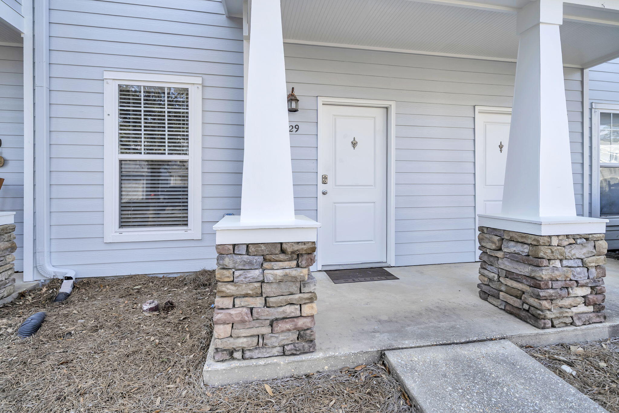 29 North Sand Palm Road Freeport, FL 32439 - Photo 2 of 40 a view of front door of house