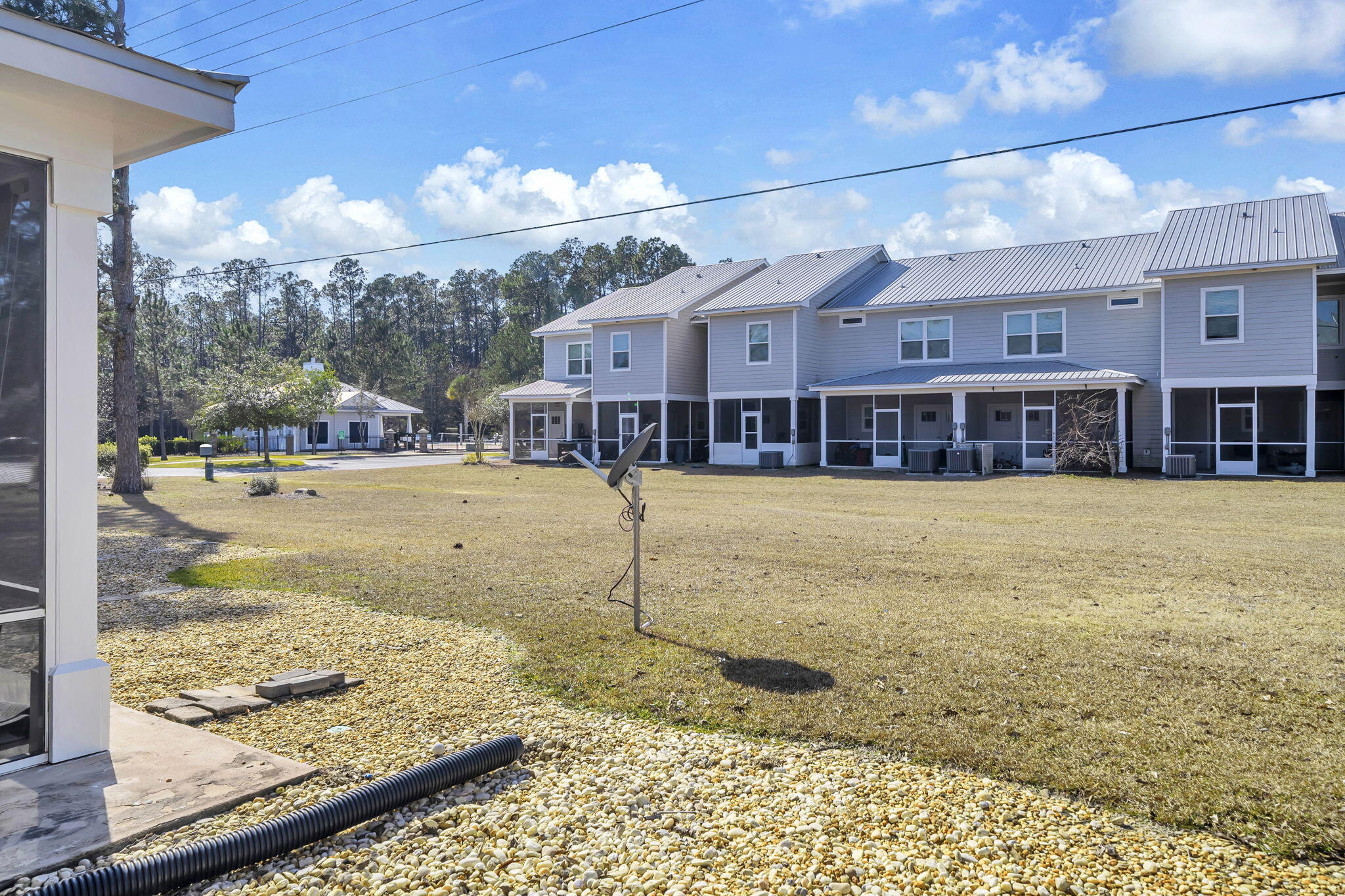 29 North Sand Palm Road Freeport, FL 32439 - Photo 25 of 40 a view of a house with a yard