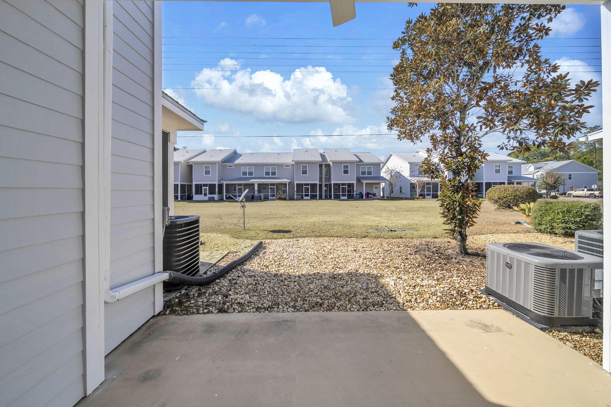 29 North Sand Palm Road Freeport, FL 32439 - Photo 27 of 40 a view of a swimming pool with a patio