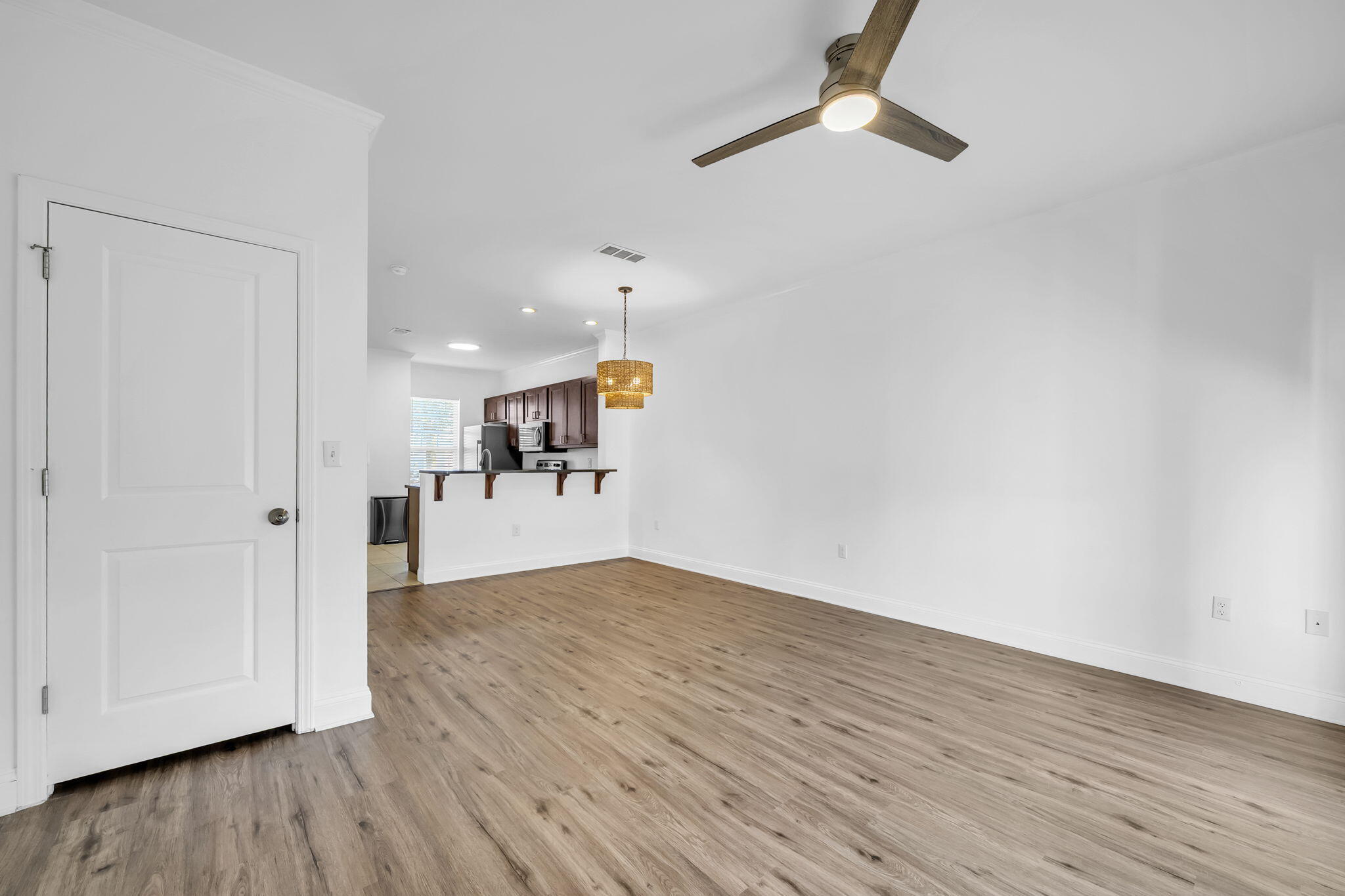 29 North Sand Palm Road Freeport, FL 32439 - Photo 30 of 40 a view of a livingroom with wooden floor
