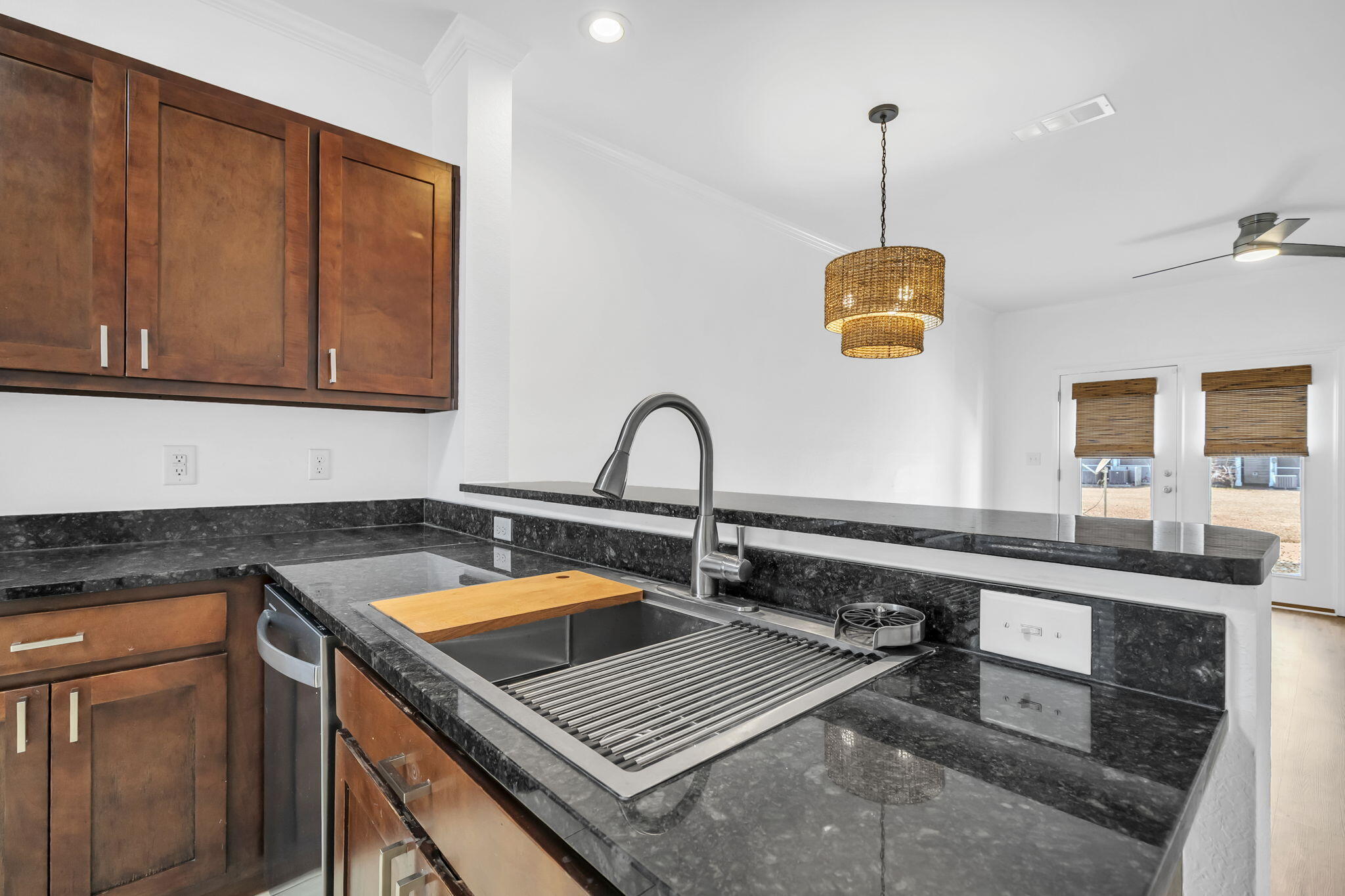 29 North Sand Palm Road Freeport, FL 32439 - Photo 35 of 40 a kitchen that has a sink stove and cabinets