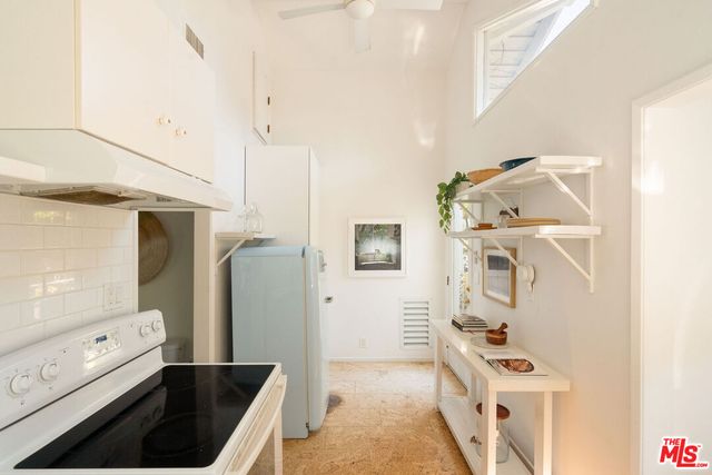 a bathroom with a tub and a sink