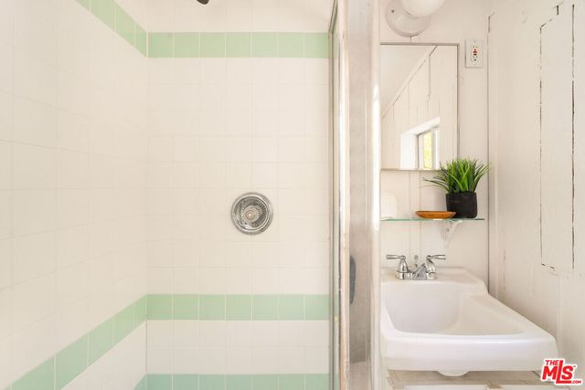 a view of a chairs and table on the wooden floor