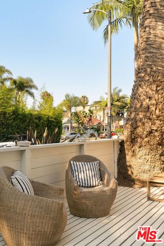 a view of balcony with furniture