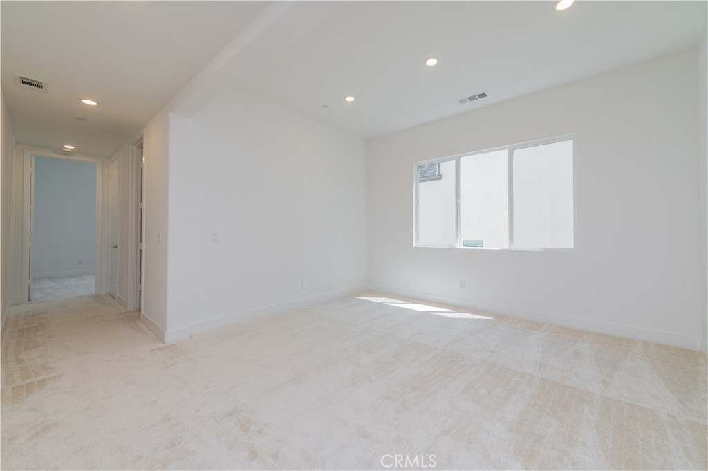 414 Treble Irvine, CA 92618 - Photo 22 of 34 an empty room with windows and closet