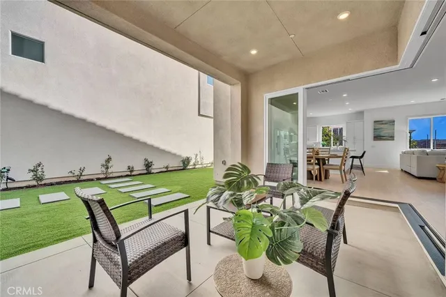 a dining room with furniture and a table