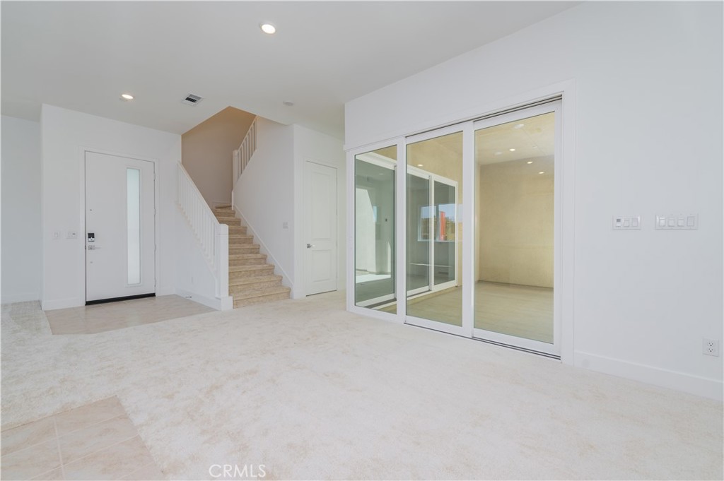 414 Treble Irvine, CA 92618 - Photo 10 of 34 an empty room with staircase