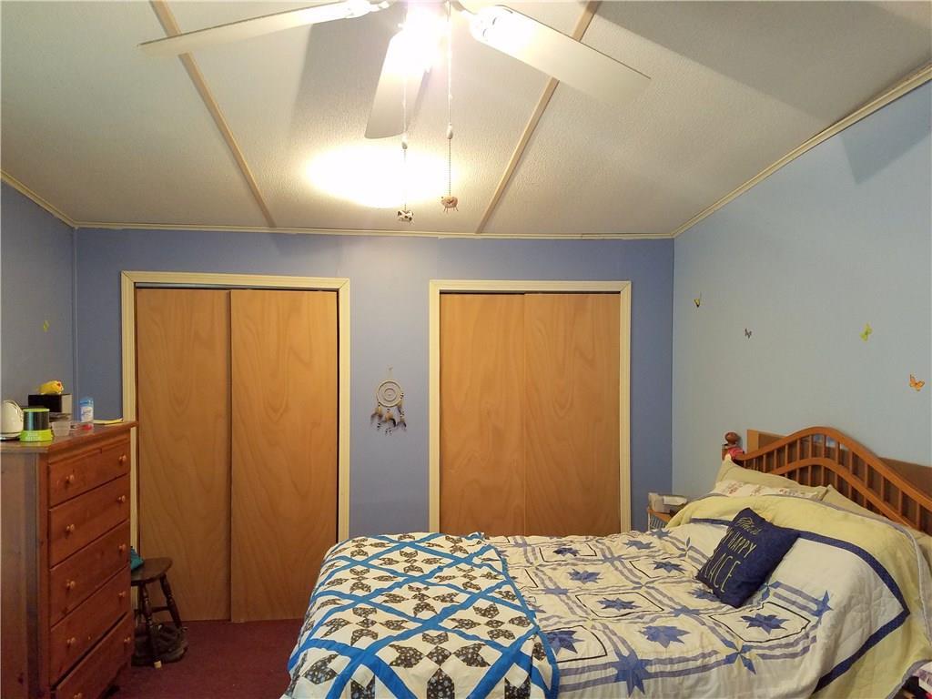 142 Riverside Drive Mechanic Falls, ME 04256 - Photo 16 of 22 Master bedroom with vaulted ceiling...