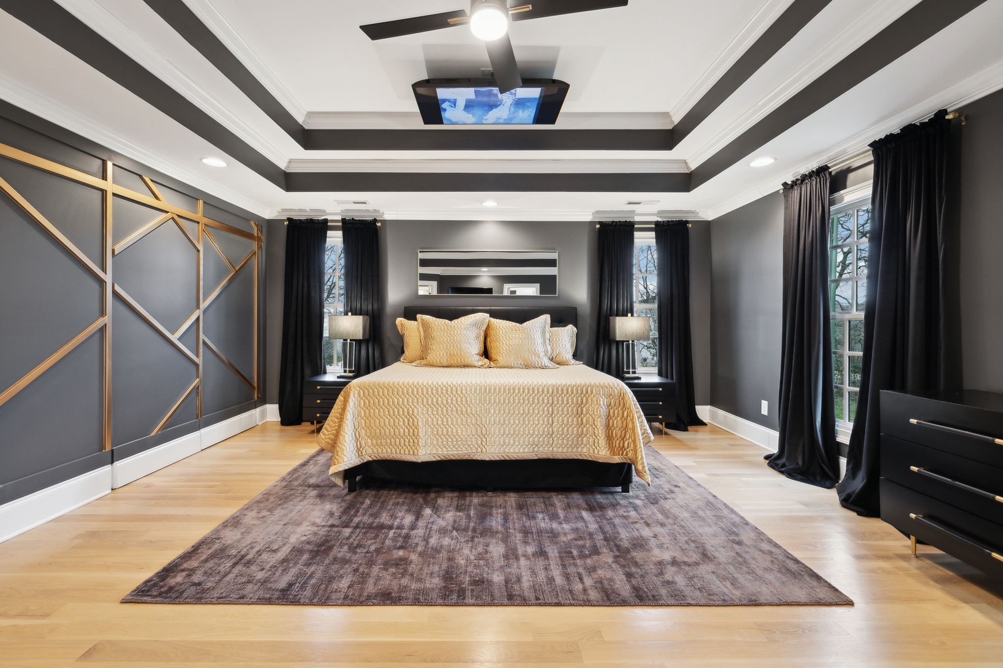 750 Walker Road Beechgrove, TN 37018 - Photo 22 of 54 a bedroom with a bed wooden floor and a television