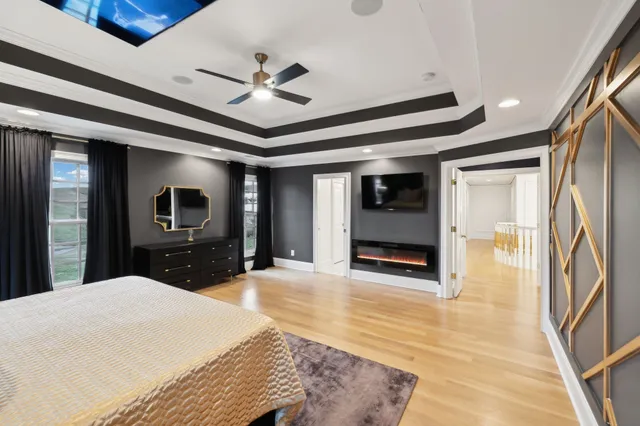 a bathroom with a sink a mirror and a shower