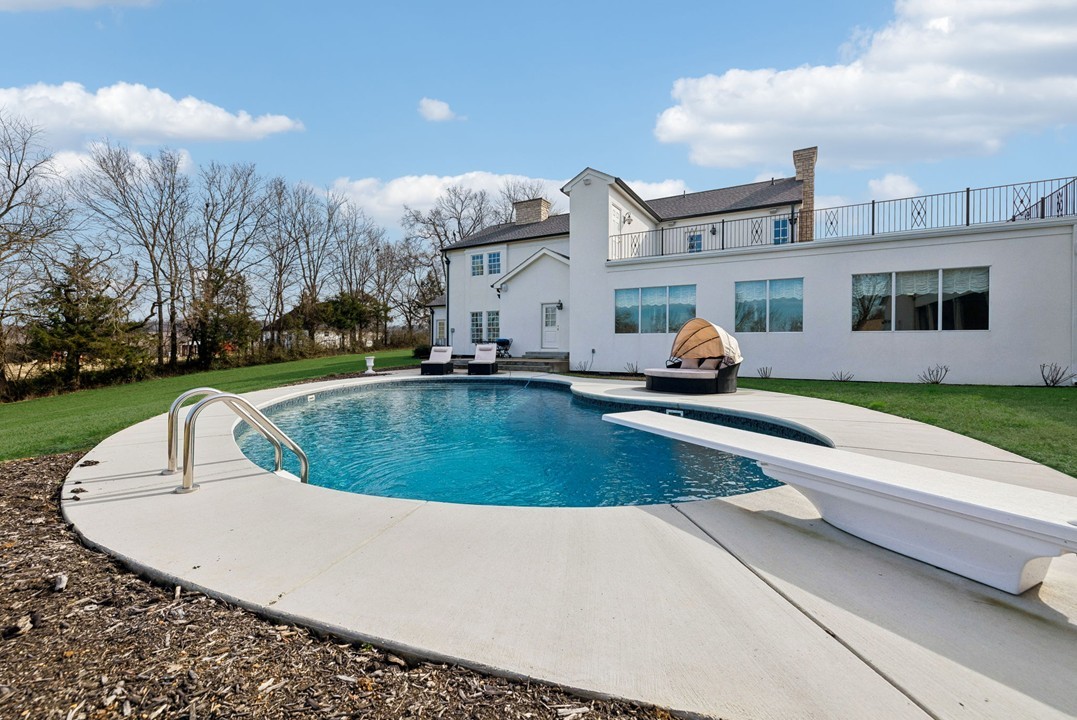 750 Walker Road Beechgrove, TN 37018 - Photo 46 of 54 a view of a house with a swimming pool