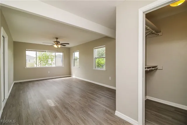 a view of an empty room and window