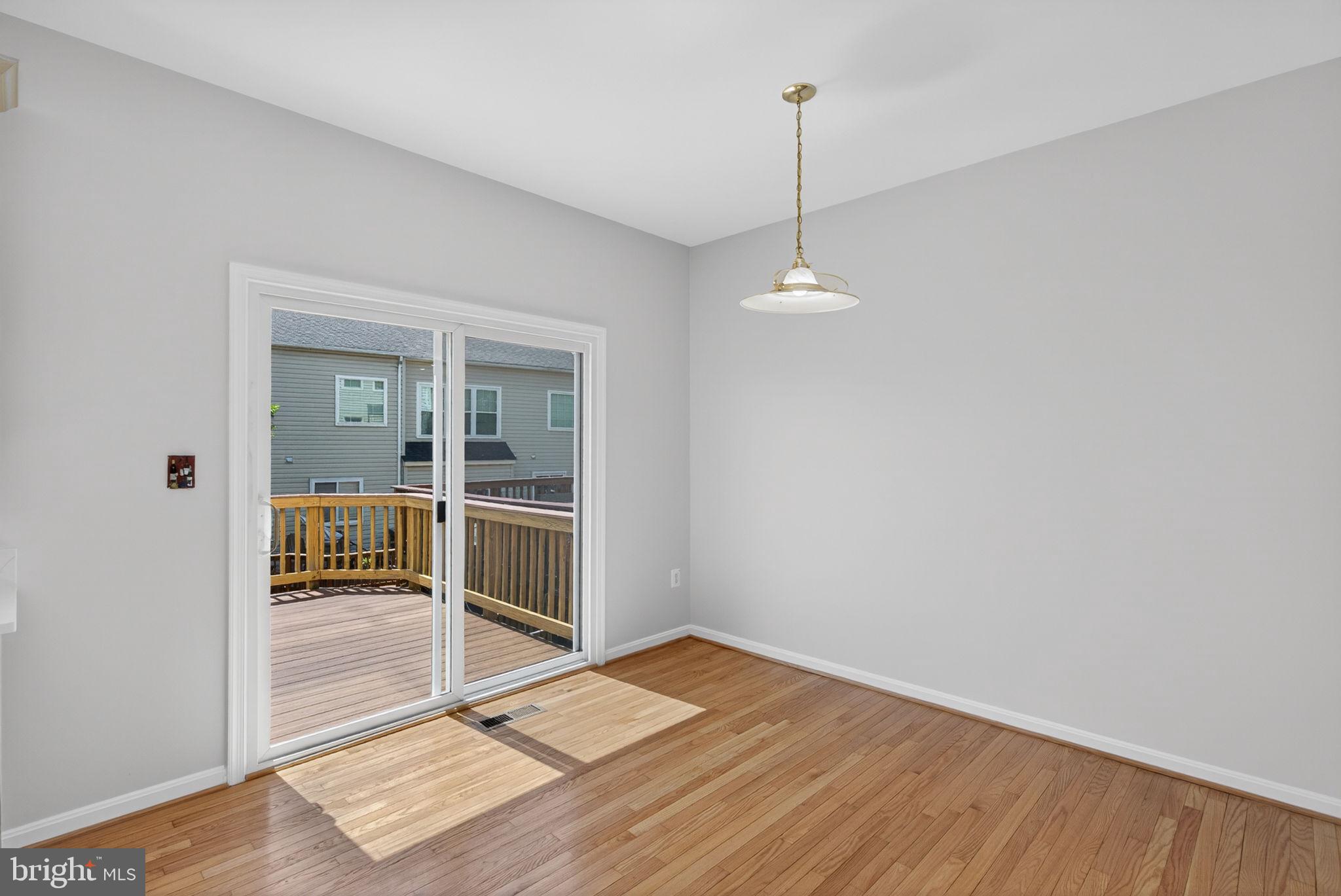 13597 Big Boulder Road Herndon, VA 20171 - Photo 14 of 41 Sliding Doors Leading To Large Deck
