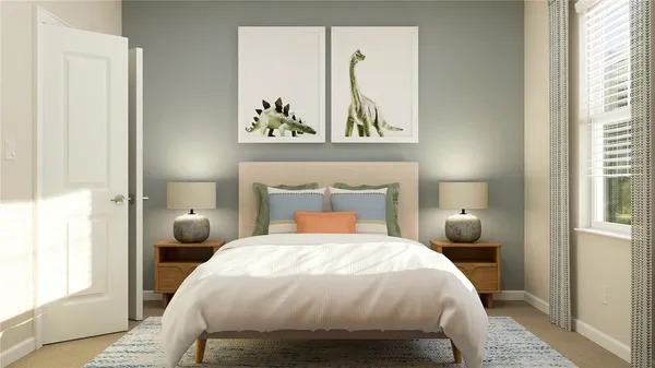 a bedroom with a bed a painting and a window