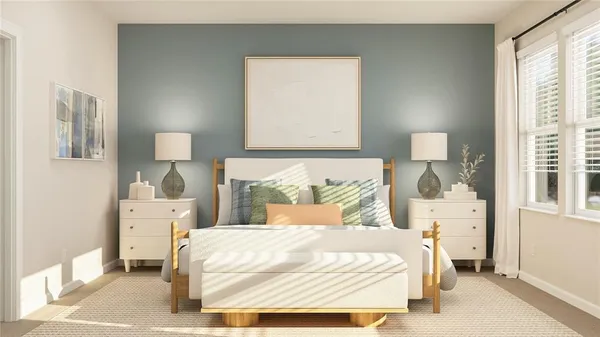 a bedroom with a bed and a night stand