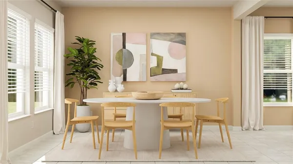 a view of a dining room with furniture and a window