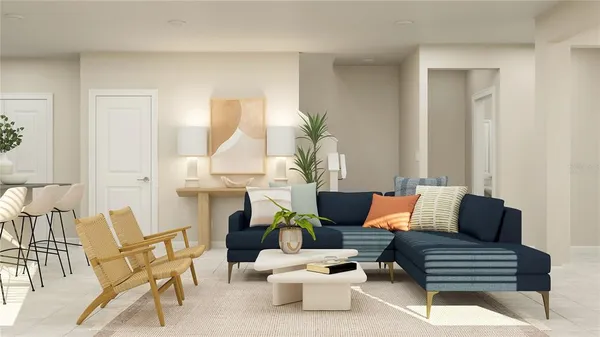 a living room with furniture a fireplace and a table