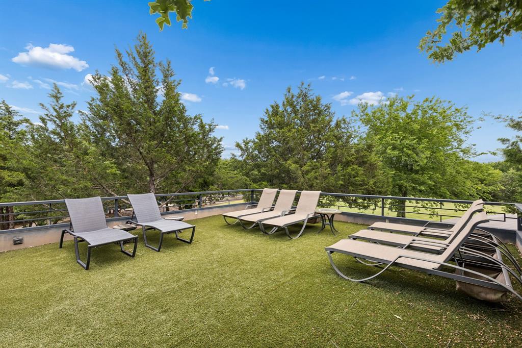 1306 Morrow Road Valley View, TX 76272 - Photo 28 of 40 a view of a swimming pool with lounge chairs