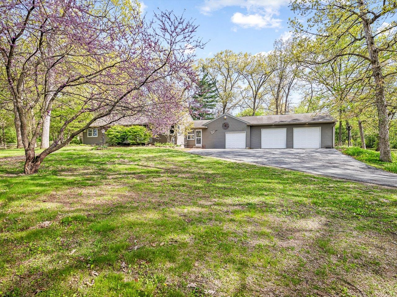 7785 Prairie Hill Road South Beloit, IL 61080 - Photo 1 of 46 a view of a house with a yard