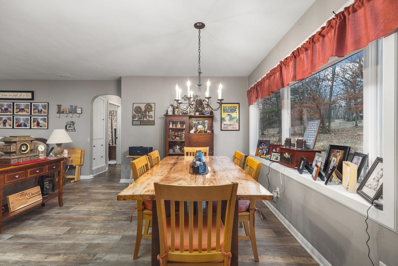 7785 Prairie Hill Road South Beloit, IL 61080 - Photo 17 of 46 a view of a dining room with furniture window and outside view